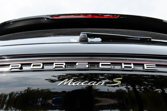 October 9, 2021, Seoul, South Korea - A detailed close-up of the rear logos on a black Porsche Macan S luxury SUV.