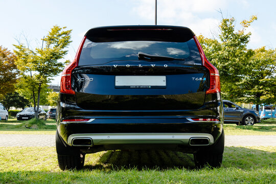 October 20, 2021, Seoul, South Korea - A rear view of a black Volvo XC90 T6 SUV parked on the grass.