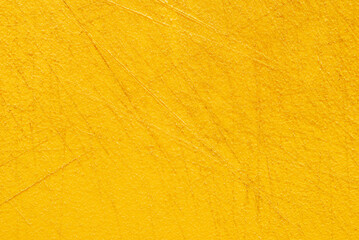 Yellow used plastic chopping board surface texture