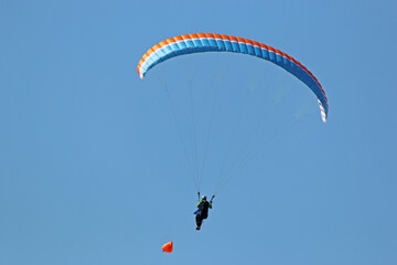 Paraglider being towed by a winch	
