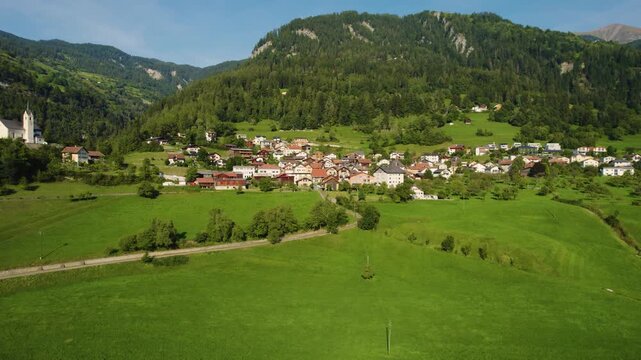 Aerial view around the village Tamins in Switzerland on a sunny day in summer