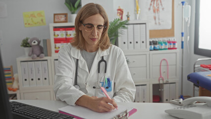 Woman pediatrician writes notes with stethoscope and visible hand at clinic building, seated at desk with clipboard; child health empathy.