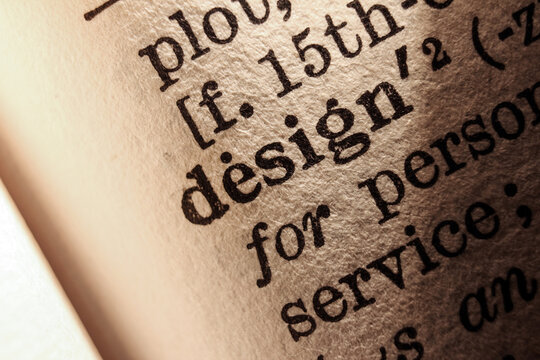 Word design printed on a dictionary page, macro 