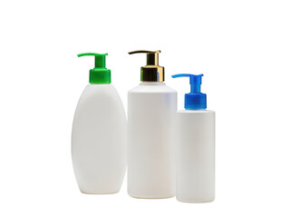 Three white plastic cosmetic bottles with green gold blue pumps for product