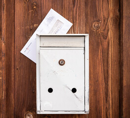 mailbox on wooden wall