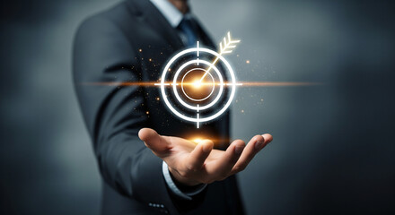 Corporate executive hand holding digital target icon symbolizing accuracy performance metrics growth success strategy visualization