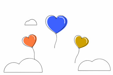 Heart-shaped balloons floating in sky