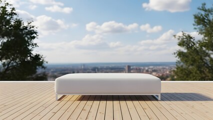 Modern outdoor daybed on a wooden deck overlooking a scenic view