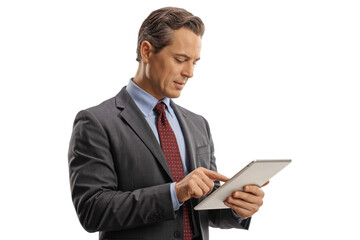 Man in suit using digital tablet
