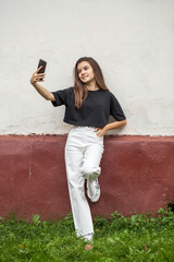 Young beautiful brunette girl, autumn park outdoors