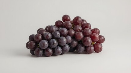 A lush cluster of vibrant purple grapes with intricate details and subtle sheen on a clean white background for food and drink concepts