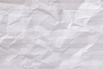 Blank musical stave from music notebook, white lined crumpled paper for design