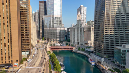 Fototapeta premium Chicago, IL - July 27, 2024: Aerial view of Chicago skyline from city river on a beautiful summer day