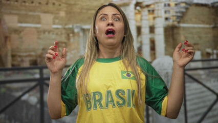 Woman clutch chest on narrow cobblestone street beside ancient stone building ruins under warm...