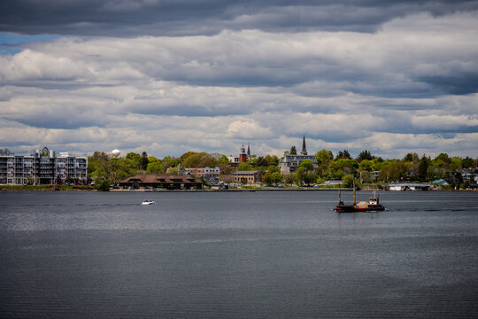 Boats on the St. Lawrence River with Gananoque waterfront skyline