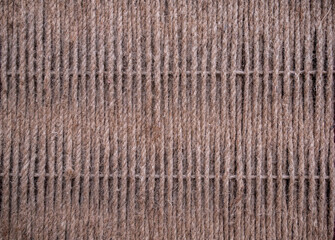 Brown tightly woven twine. Closeup of natural background