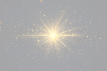 Golden lens flare burst with shimmering glitter particles and bright starburst effect on transparent background.