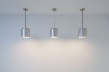 Modern pendant lights in linear arrangement