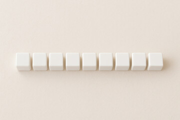 An even row of identical white cubes on a neutral background. Space for text.