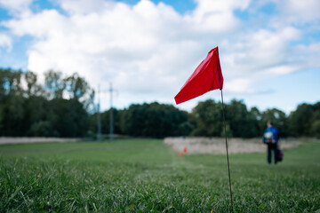 red flag on the disc golf course