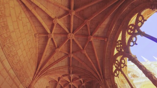 Lisbon, Portugal - July 6 2025: The cross arche structure in the cloister of Jer&oacute;nimos Monastery in Lisbon Portugal