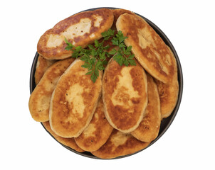 Traditional home baked fried potato pies with crispy crust and soft potato filling, classic домашняя выпечка served on plate, isolated on white background.
