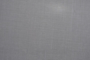 A soft grey textured background featuring a subtle crosshatch pattern, creating a clean, minimal, and neutral surface ideal for product photography, graphic design, or creative visual layouts.