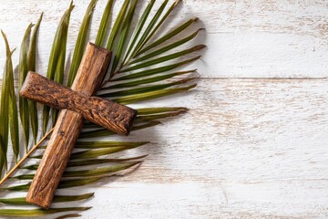 Faithful Reverence. Cross and Palm on Rustic White Backdrop, Symbolizing Easter's Spiritual Essence