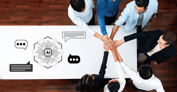 A diverse group of professionals engaged in collaboration around an artificial intelligence concept, emphasizing teamwork, communication, and innovative ideas in a modern workplace setting. Gantry - Powered by Adobe