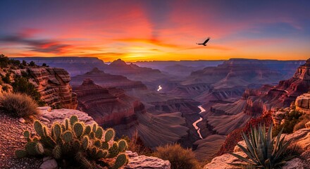 the sun is setting over the grand canyon