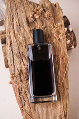 Perfume bottle mockup with cream background, mockup for your perfume product brand