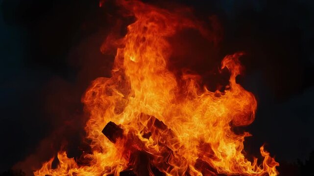 Dramatic Flames Dancing Against a Dark Background for Captivating Visuals