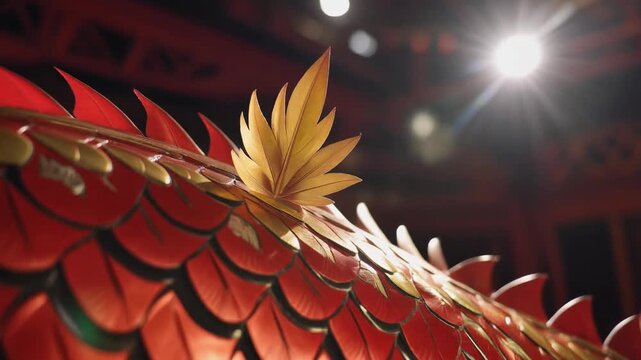 The Phoenix Feather Detail. Chinese New Year. An extreme close-up of a small detail on the dragon's body&mdash;a stylized phoenix feather motif&mdash;catching the harsh, bright spotlight from a nearby stage.

