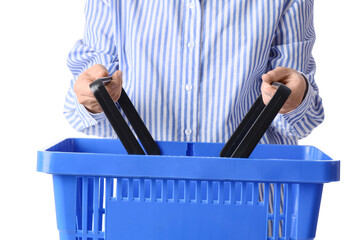 Woman with blue shopping basket on white background