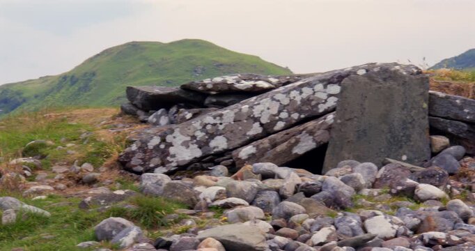 Panning left to right mid shot of the South Cairn southern chamber Entrance at Nether Largie Standing Stones at Kilmartin