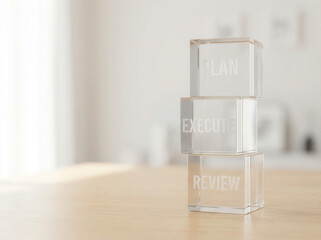 Productivity roadmap cubes positioned with natural depth and softly illuminated blurred white background