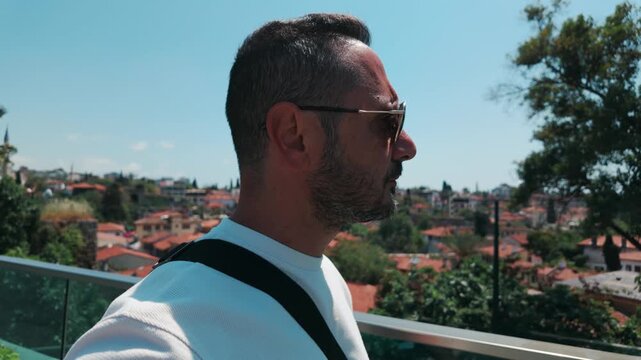 A tourist man visit Mediterranean coastal city Antalya in Turkey