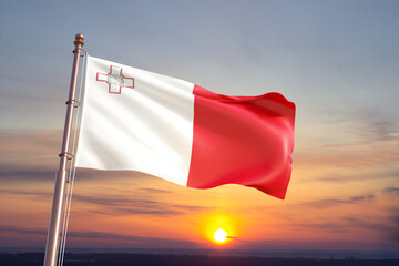 Flag of Malta against the sunset. National Holidays concept