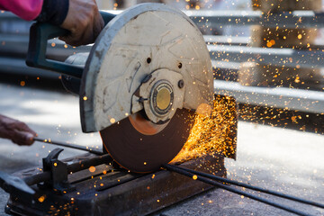 Metal Cutting with Abrasive Saw in Workshop