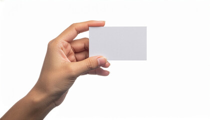 Obraz premium Close-up of a human hand holding a blank business card isolated on white background. Minimal corporate mockup concept for branding, identity design, networking, startup, and professional business