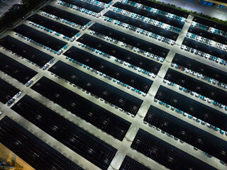 Night View of Solar Canopy Parking Lot with Illuminated Panels