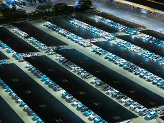 Night View of Solar Canopy Parking Lot with Illuminated Panels