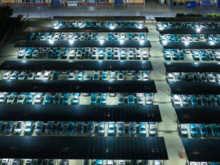 Night View of Solar Canopy Parking Lot with Illuminated Panels