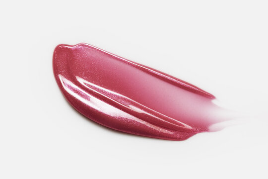 Lip gloss texture. Liquid lipstick smudge swatch smear. Shimmery creamy makeup stroke isolated on white background