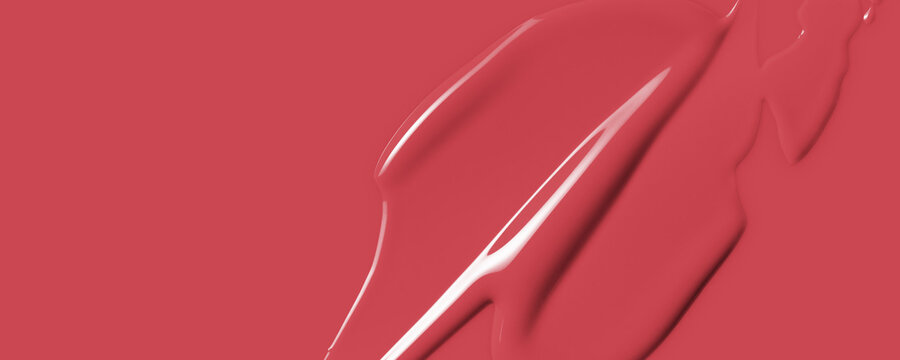 Lipstick texture color background. Red creamy makeup product or paint swatch. Lliquid lipstick or lip gloss smear closeup