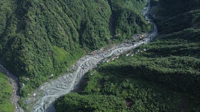 The view of Kali Kabur between two hills, the traditional gold mining site from PT Freeport Indonesia's tailings has become a source of income for many residents of Mimika Regency.