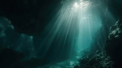Obraz premium Underwater Scene with Sunbeams Filtering Through Dark Water Illuminating Rock Formations and Aquatic Plants in a Submerged Cave