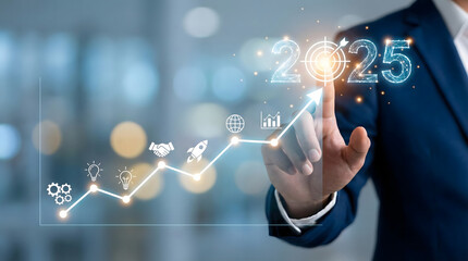 Businessman touching 2025 virtual interface,new year business goals concept,future financial forecast,corporate strategy planning,target achievement graph,economic growth prediction.