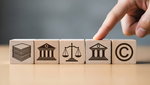 Upholding intellectual property and legal protection A hand points to a copyright symbol block, surrounded by icons symbolizing justice, law, and government institutions