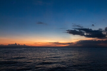 Vibrant Ocean Sunset with Cloudscape and Natural Light for Serene Travel and Vacation Imagery, showcasing the beauty of nature